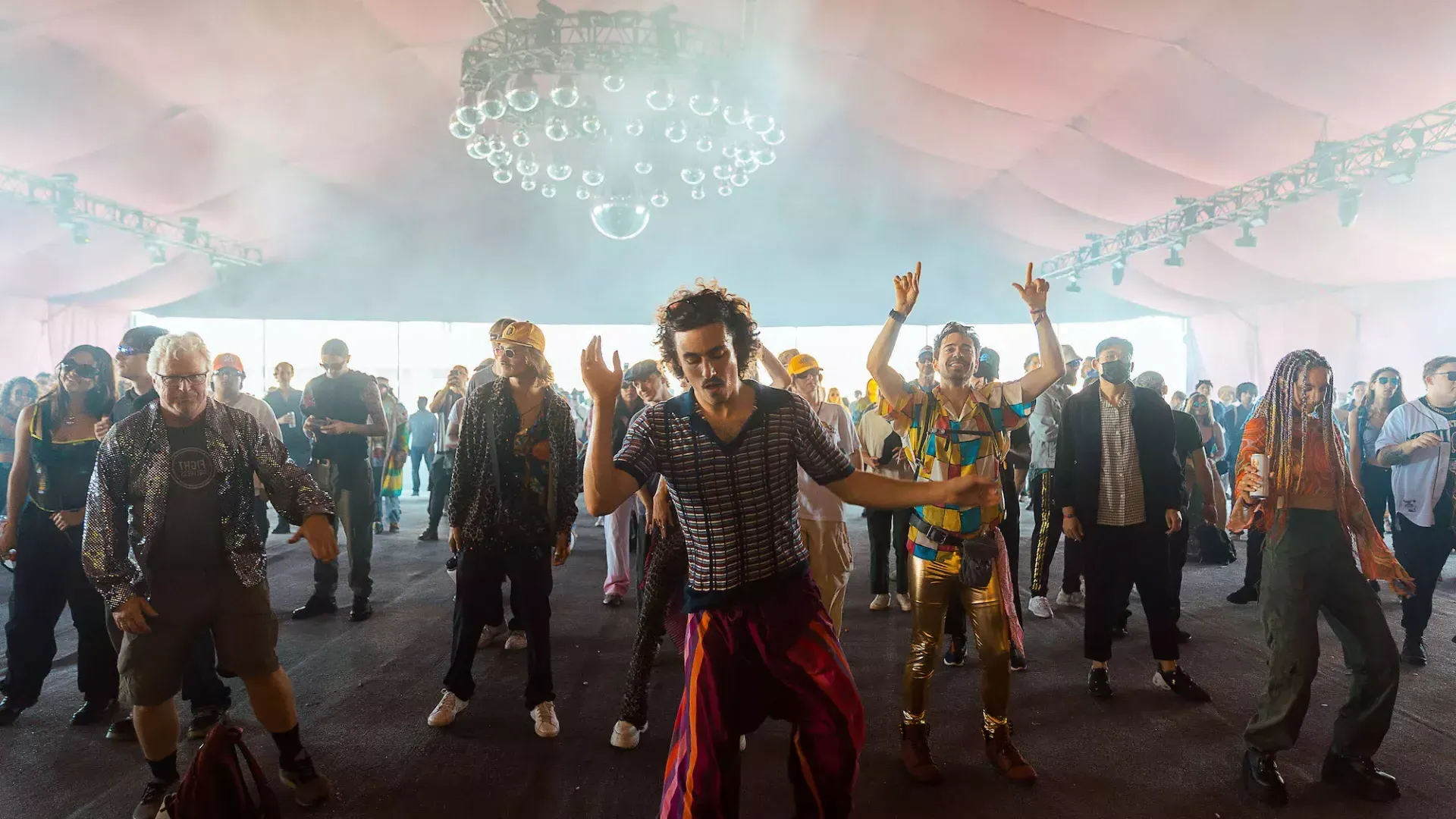 Festival attendees dance at the Portola Music Festival